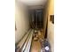 Hallway in need of renovation, showing exposed framing and building materials at 9314 Seymour Ln, Davidson, NC 28036