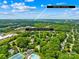 Aerial view of the neighborhood showing its proximity to Birkdale Village and other amenities at 9514 Hayenridge Ct, Huntersville, NC 28078