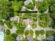 Aerial view of property on a 0.32 acre lot surrounded by mature trees and manicured lawns at 9514 Hayenridge Ct, Huntersville, NC 28078
