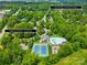 An aerial shot showing the neighborhood pool, tennis courts, and playground within a short walk from the property at 9514 Hayenridge Ct, Huntersville, NC 28078