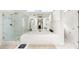 Spa-like bathroom featuring a glass shower, garden tub, and dual sinks at 9514 Hayenridge Ct, Huntersville, NC 28078