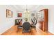 Elegant dining room with hardwood floors, chandelier, and traditional furnishings, perfect for entertaining at 9514 Hayenridge Ct, Huntersville, NC 28078