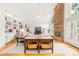 Spacious living room with a stone fireplace, built-in shelving and hardwood floors at 9514 Hayenridge Ct, Huntersville, NC 28078
