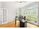 Bright home office featuring large windows with scenic views and ample natural light at 9514 Hayenridge Ct, Huntersville, NC 28078