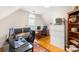 Bright office with multiple workspaces, hardwood floors, and a large window at 9514 Hayenridge Ct, Huntersville, NC 28078