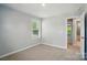Bright bedroom with plush carpet and a window provides peaceful natural light at 9846 Quercus Ln, Huntersville, NC 28078