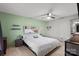 This bedroom features a ceiling fan and lots of natural light at 1013 Ashwood Pl, Salisbury, NC 28146