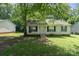 Attractive one-story home with cozy front porch and charming curb appeal at 1013 Ashwood Pl, Salisbury, NC 28146