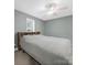Bedroom with neutral carpet, ceiling fan, and window at 1015 Rhode Island Ave, Kannapolis, NC 28083