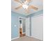 Bedroom with closet and attached bath access, ceiling fan, and neutral carpet at 1015 Rhode Island Ave, Kannapolis, NC 28083