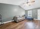 Comfortable living room featuring vaulted ceilings, ceiling fan, and cozy seating arrangement at 1015 Rhode Island Ave, Kannapolis, NC 28083