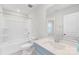 Bright bathroom featuring a shower-tub combination, modern vanity, and neutral color palette at 1022 Maltby St, Charlotte, NC 28217