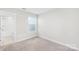 Carpeted bedroom with natural light and window at 1022 Maltby St, Charlotte, NC 28217