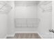 Walk-in closet with wire shelving and carpet at 1022 Maltby St, Charlotte, NC 28217