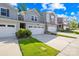 Charming townhomes with well-manicured lawns and attached garages, showcasing modern curb appeal at 1022 Maltby St, Charlotte, NC 28217