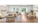 Cozy living room featuring a comfortable sofa and dining area with natural lighting at 1022 Maltby St, Charlotte, NC 28217