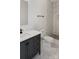 Modern bathroom features marble floors, a sleek vanity, and a luxurious shower at 103 Wadesborough Pl, Wadesboro, NC 28170