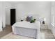 Cozy bedroom showcasing a comfortable bed, calming decor, and ample natural light at 103 Wadesborough Pl, Wadesboro, NC 28170