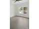 Well-lit empty room with great natural light and neutral flooring at 103 Wadesborough Pl, Wadesboro, NC 28170