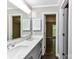 This bathroom features a double sink vanity and a view into the bedroom at 1117 Hidden Brook Ln, Clover, SC 29710
