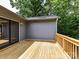 The spacious wooden deck is perfect for outdoor entertaining with room for seating and grilling at 1117 Hidden Brook Ln, Clover, SC 29710