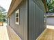 View of the home's exterior showing the long deck, siding, and window at 1117 Hidden Brook Ln, Clover, SC 29710
