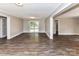 Spacious living room with hardwood floors and sliding glass doors leading to a porch or patio at 1117 Hidden Brook Ln, Clover, SC 29710