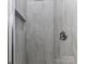 The shower features a gray tile surround and a chrome shower head at 1117 Hidden Brook Ln, Clover, SC 29710