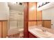 Functional bathroom with a shower-tub combo, and wood cabinets at 1145 Craigbrow Cir, Chester, SC 29706