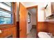 Compact bathroom features wood paneling and a well-lit vanity at 1145 Craigbrow Cir, Chester, SC 29706