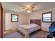 Cozy bedroom with a ceiling fan, carpeted floors, and natural light at 1145 Craigbrow Cir, Chester, SC 29706