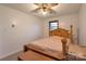 Cozy bedroom features include a wood bed frame and ceiling fan at 1145 Craigbrow Cir, Chester, SC 29706