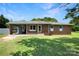 Charming brick ranch home with a covered carport and manicured lawn at 1145 Craigbrow Cir, Chester, SC 29706