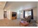 Cozy living room with soft carpet and a large TV at 1145 Craigbrow Cir, Chester, SC 29706