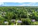 Stunning aerial view highlighting the home and the surrounding lush, green landscape with mature trees at 118 Creek Hollow Trl, Belmont, NC 28012