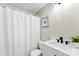 Bathroom with white walls, a shower and bath with white curtains, and a nice sink at 118 Creek Hollow Trl, Belmont, NC 28012
