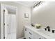 Bathroom featuring double sinks, and modern fixtures, next to the shower and bath area at 118 Creek Hollow Trl, Belmont, NC 28012