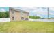 Large, level backyard perfect for recreation and entertaining at 128 Hickory Ridge Dr, Locust, NC 28097