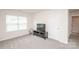 Bonus room with a tv and neutral colored walls at 128 Hickory Ridge Dr, Locust, NC 28097