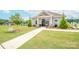 Charming clubhouse with manicured landscaping offers a welcoming and attractive community amenity at 128 Hickory Ridge Dr, Locust, NC 28097