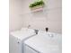 Convenient laundry room with modern, front-load washer and dryer at 128 Hickory Ridge Dr, Locust, NC 28097