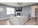 Comfortable living room featuring a fireplace and a flat screen television above at 128 Hickory Ridge Dr, Locust, NC 28097