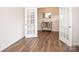 Bright office space with French doors and dark wood floors at 128 Hickory Ridge Dr, Locust, NC 28097