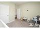 Cozy playroom with rocking chair and a variety of toys at 128 Hickory Ridge Dr, Locust, NC 28097