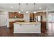 Gourmet kitchen features granite countertops, stainless steel appliances and a kitchen island at 128 Yellowbell Rd, Mooresville, NC 28117