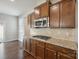 Well-equipped kitchen with a gas cooktop, stainless steel appliances, and ample cabinet space at 128 Yellowbell Rd, Mooresville, NC 28117