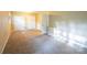 Bedroom featuring neutral carpet and built-in storage at 1332 Midwood Dr, Gastonia, NC 28052