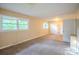 Bedroom featuring neutral carpet, double closets, and natural light at 1332 Midwood Dr, Gastonia, NC 28052