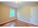 Bedroom featuring hardwood floors and window at 1332 Midwood Dr, Gastonia, NC 28052