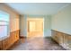 Dining room with hardwood floors and view to another room at 1332 Midwood Dr, Gastonia, NC 28052